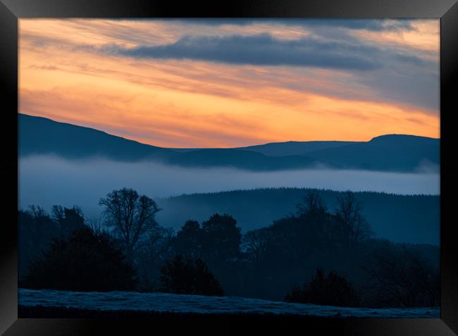 Early Morning mist in the hills. Framed Print by Dave Collins