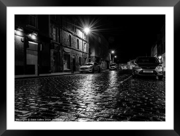 Rain soaked cobbled street at night, Kelso, Scotla Framed Mounted Print by Dave Collins
