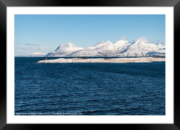 Snow covered hills on the Norwegian Coast in winter Framed Mounted Print by Dave Collins