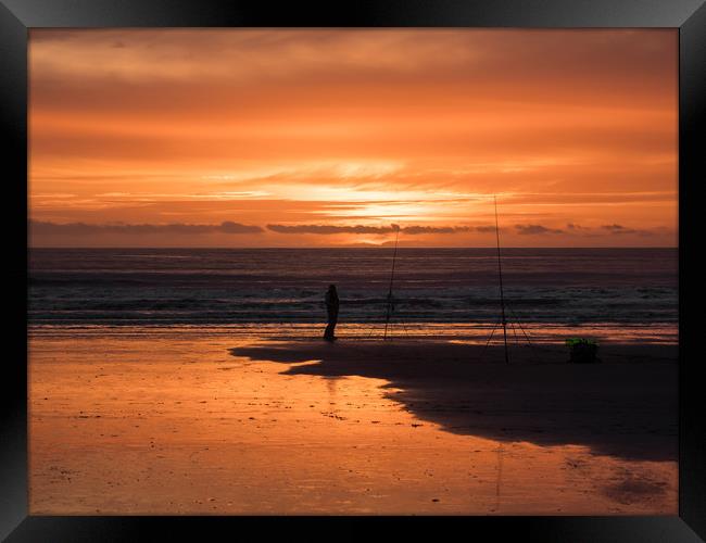 Fisherman and a Glorious Sunset at Newgale. Framed Print by Colin Allen