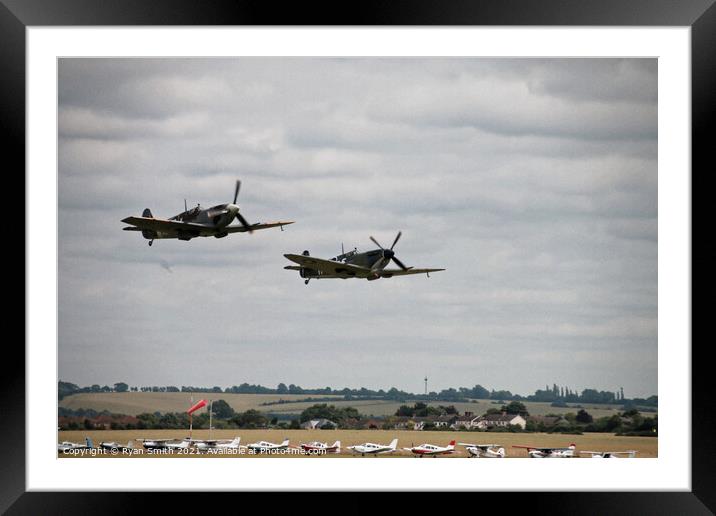 Spitfire and Hurricane flying in low level formation Framed Mounted Print by Ryan Smith