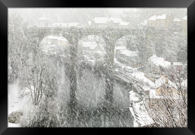 Winter snow storm over the railway viaduct at Knaresborough, North Yorkshire, UK Framed Print by mike morley