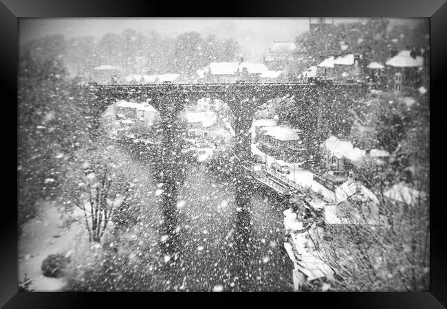 Winter snow storm over the railway viaduct at Knaresborough, North Yorkshire, UK Framed Print by mike morley