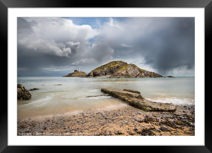 Mumbles lighthouse hail storm Framed Mounted Print by Bryn Morgan
