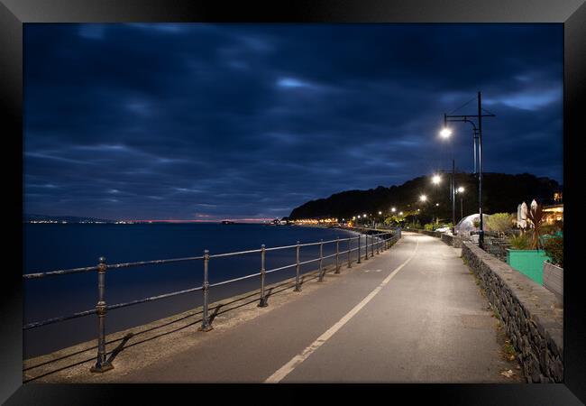 Mumbles pier and waterfront at daybreak on an Autu Framed Print by Bryn Morgan
