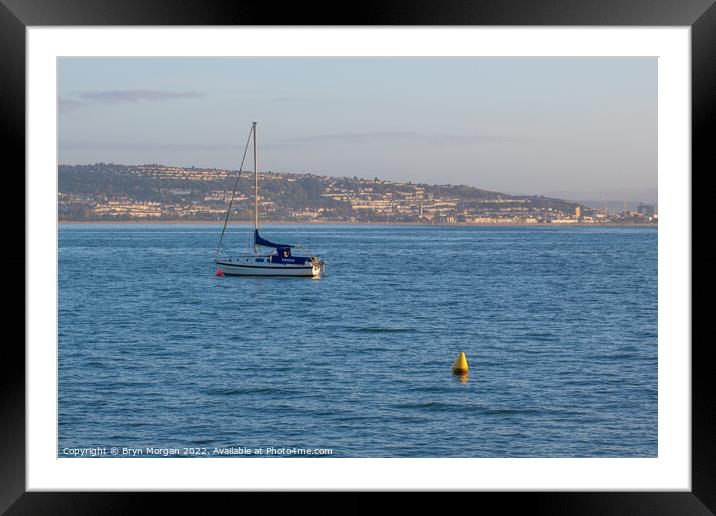 Small boat on Swansea bay Framed Mounted Print by Bryn Morgan