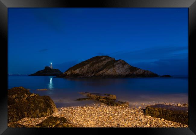 Mumbles lighthouse at night Framed Print by Bryn Morgan