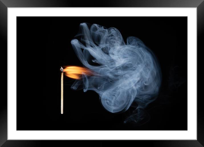 Burning match with smoke and flames Framed Mounted Print by Bryn Morgan