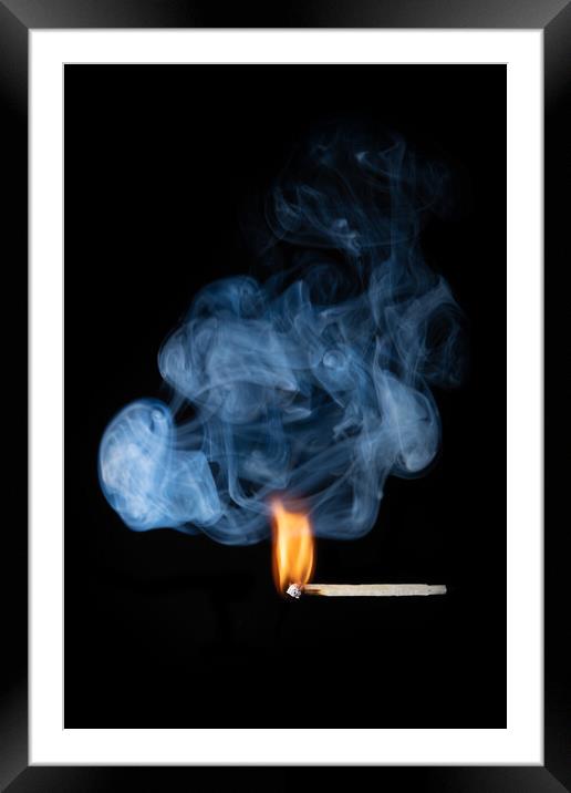 Burning match with smoke and flames Framed Mounted Print by Bryn Morgan