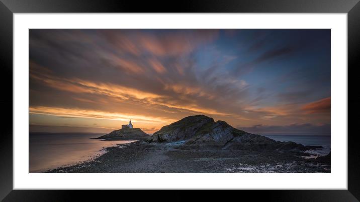 Sunrise at Mumbles lighthouse. Framed Mounted Print by Bryn Morgan