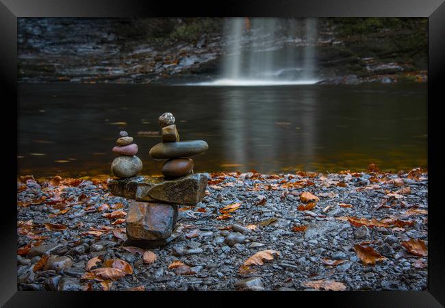 Stacking stones at the Lady Falls. Framed Print by Bryn Morgan