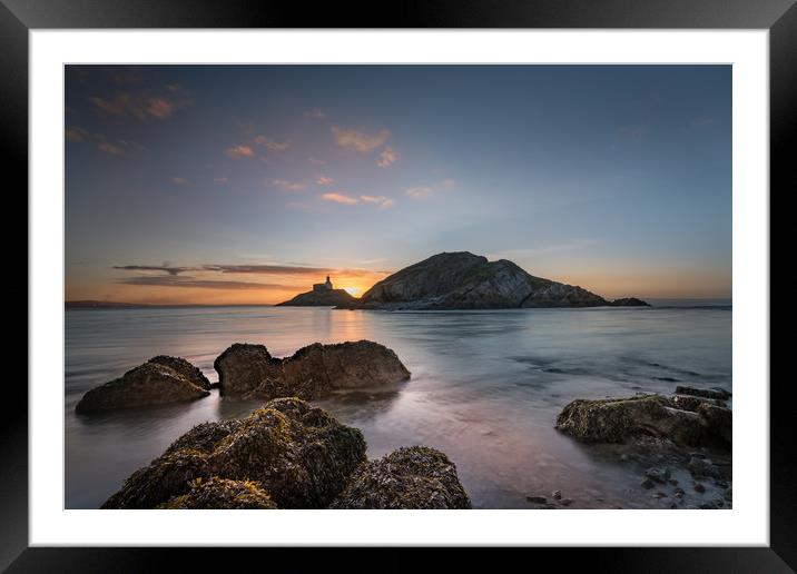 Sunrise at Mumbles lighthouse. Framed Mounted Print by Bryn Morgan