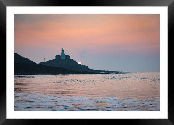 Sunrise at Mumbles lighthouse. Framed Mounted Print by Bryn Morgan