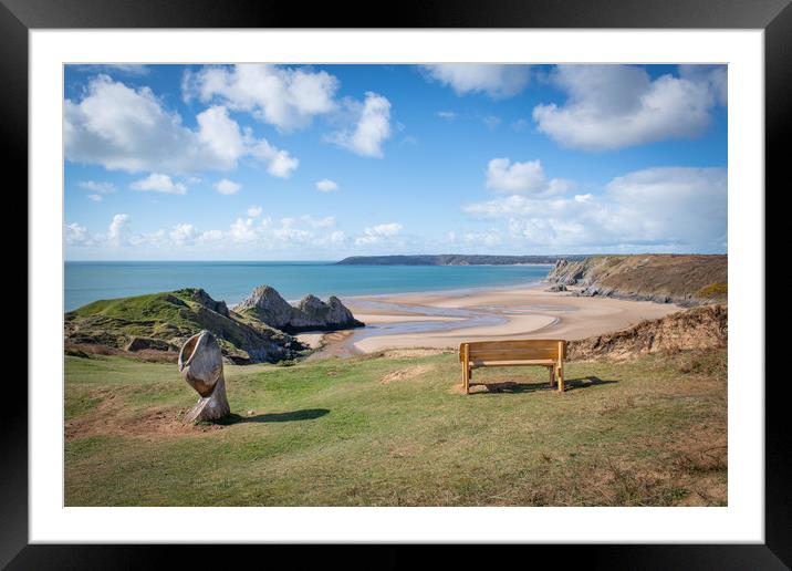 Bench overlooking Three cliffs bay. Framed Mounted Print by Bryn Morgan