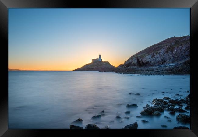 Mumbles lighthouse at sunrise. Framed Print by Bryn Morgan