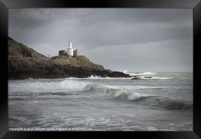 Wave at Mumbles lighthouse Framed Print by Bryn Morgan