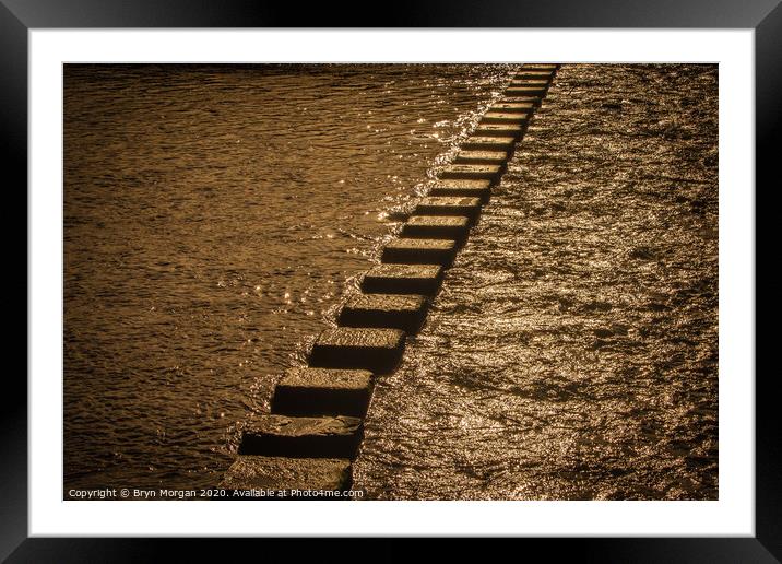 Three cliffs bay stepping stones Framed Mounted Print by Bryn Morgan