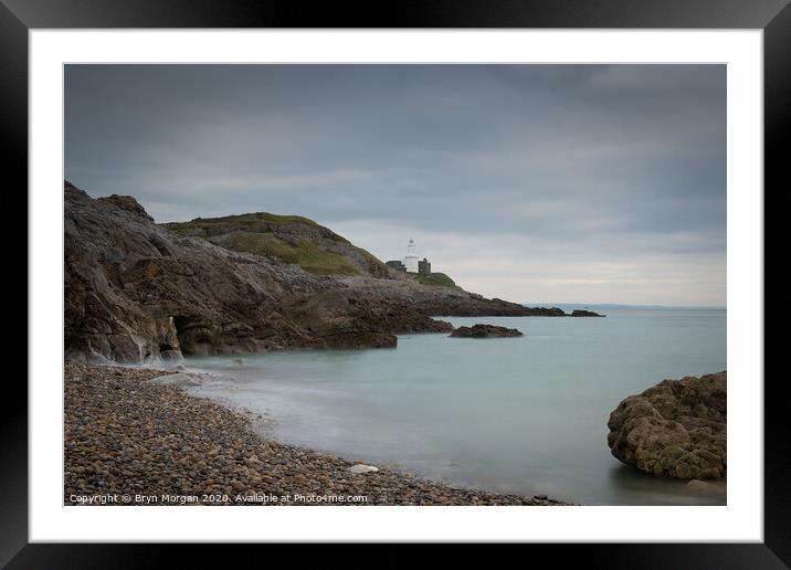 Mumbles lighthouse viewed from Bracelet bay Framed Mounted Print by Bryn Morgan
