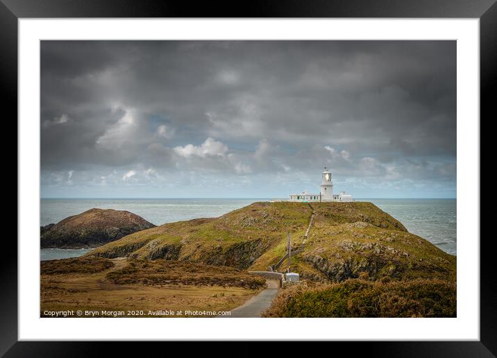 Strumble head lighthouse Framed Mounted Print by Bryn Morgan