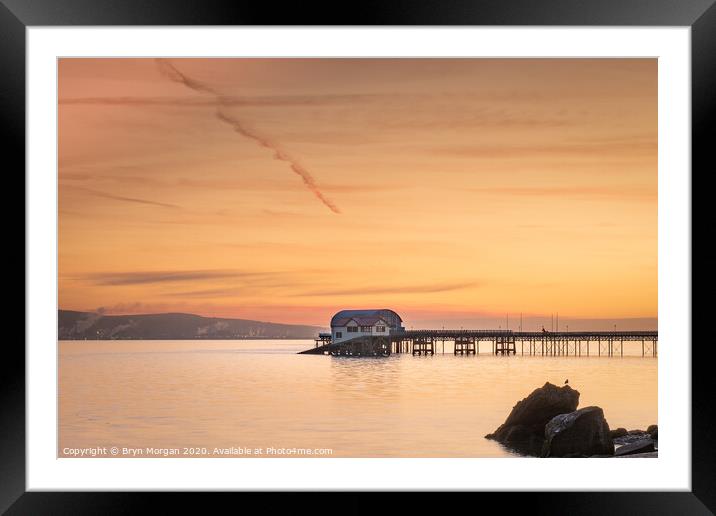 Mumbles pier and old lifeboat house viewed from Knab rock Framed Mounted Print by Bryn Morgan