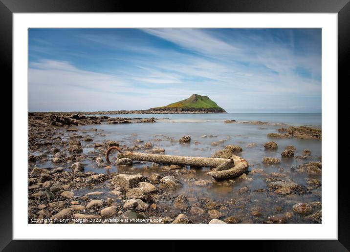 The Worms head, Rhossili, with the anchor of the Samuel Framed Mounted Print by Bryn Morgan