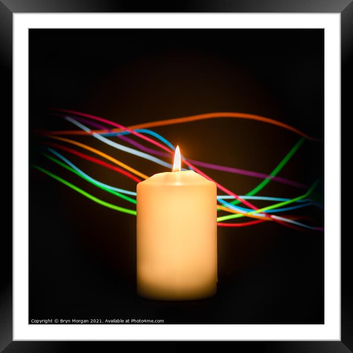 Candle with streaks of light Framed Mounted Print by Bryn Morgan