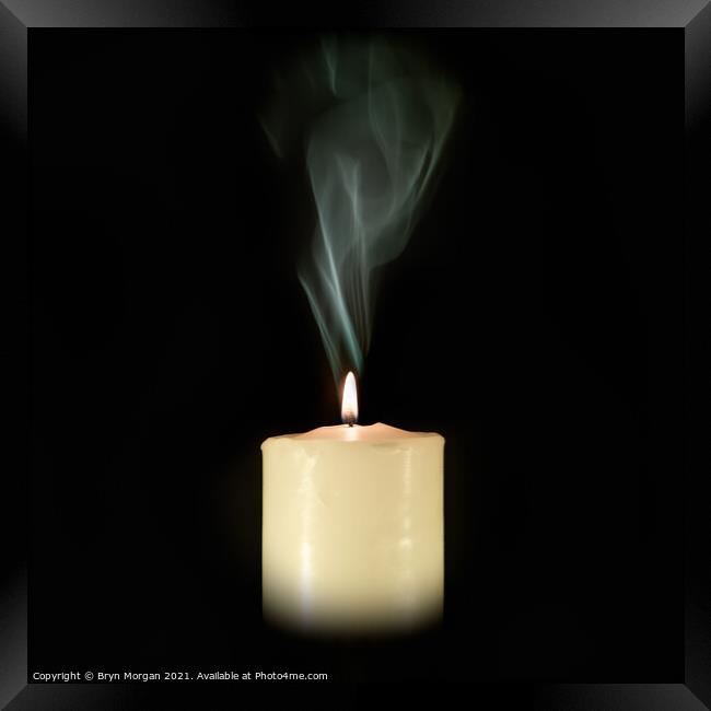 Candle with flowing smoke Framed Print by Bryn Morgan