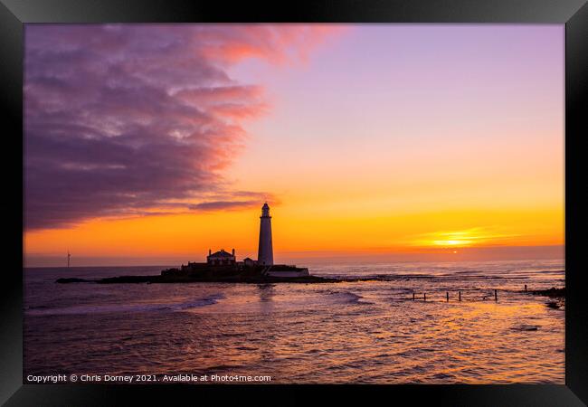 Sunrise at St. Marys Lighthouse in Northumberland, UK Framed Print by Chris Dorney