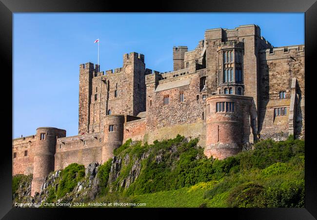 Bamburgh Castle in Northumberland, UK Framed Print by Chris Dorney