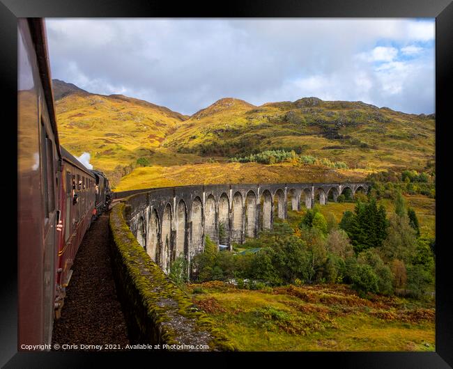 Jacobite Express Steam Train on the Glenfinnan Viaduct Framed Print by Chris Dorney