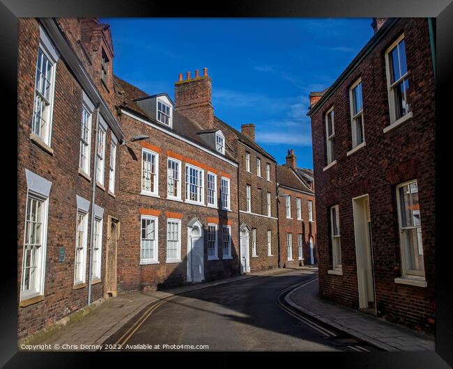 Queen Street in Kings Lynn, Norfolk, UK Framed Print by Chris Dorney