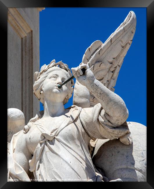 Sculpture at the base of the Joseph I Statue in Lisbon, Portugal Framed Print by Chris Dorney