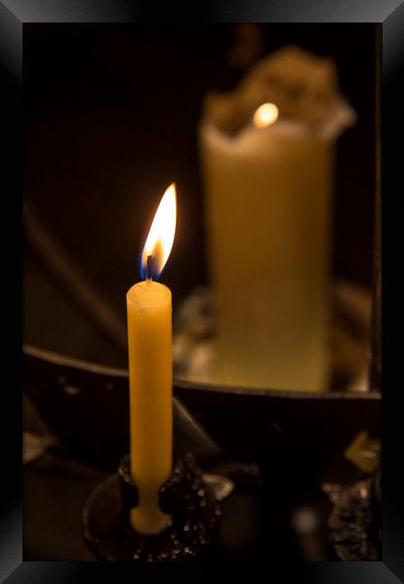 Illuminated Candle Framed Print by Chris Dorney