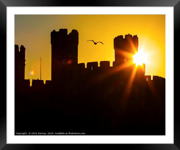 Caernarfon Castle at Sunset in North Wales, UK Framed Mounted Print by Chris Dorney