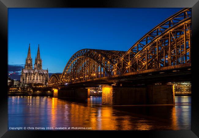Cologne Cathedral and the Hohenzollern Bridge  Framed Print by Chris Dorney