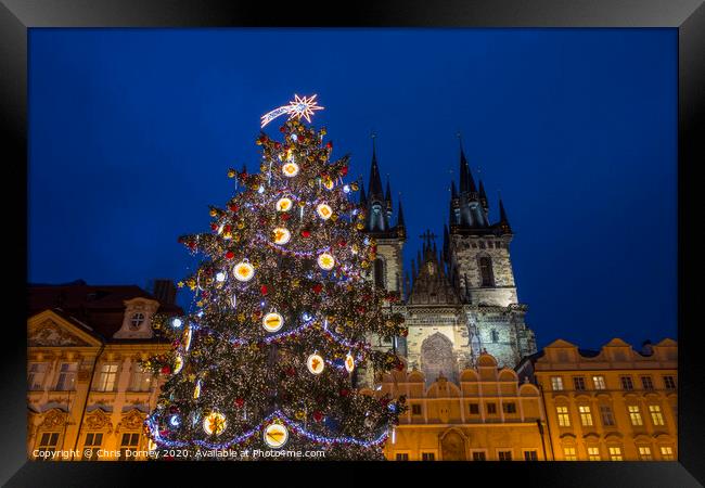 Prague at Christmas Framed Print by Chris Dorney