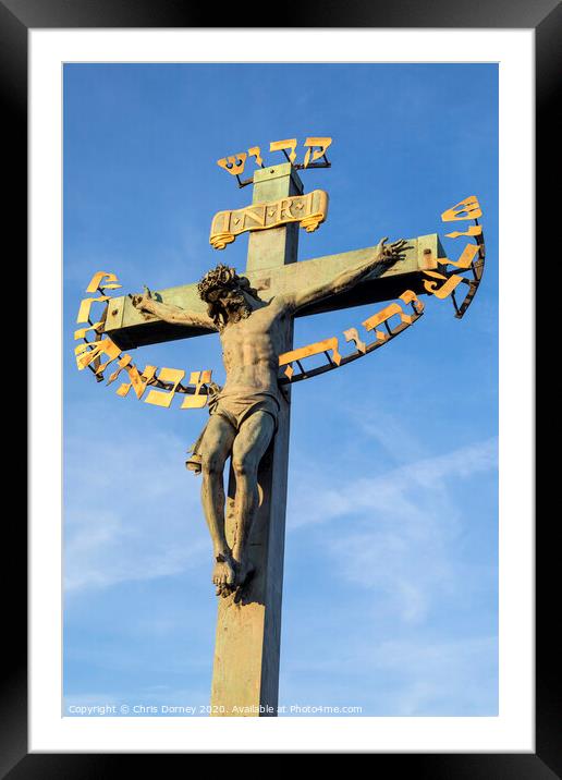 Crucifix Statue on the Charles Bridge in Prague Framed Mounted Print by Chris Dorney