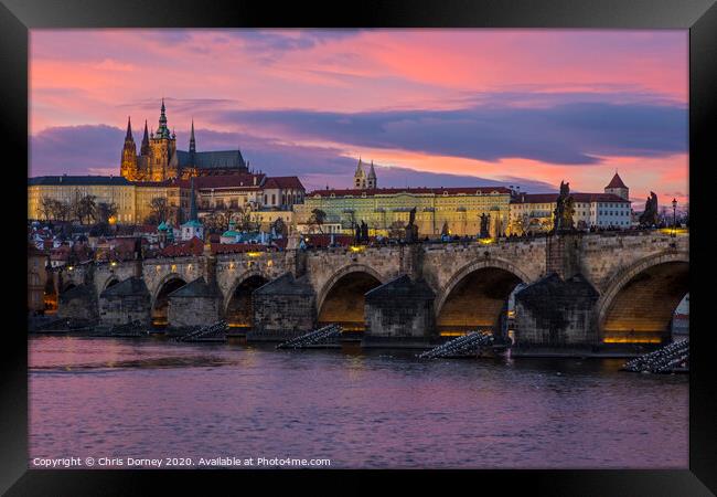 Prague Castle and the Charles Bridge Framed Print by Chris Dorney