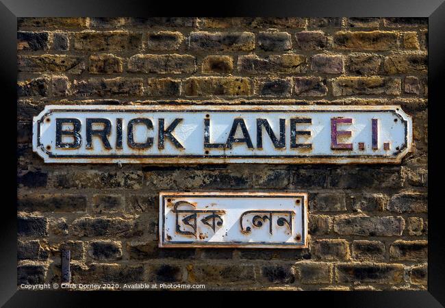 Brick Lane in London Framed Print by Chris Dorney