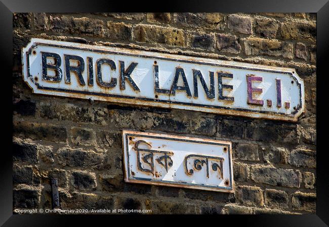 Brick Lane in London Framed Print by Chris Dorney