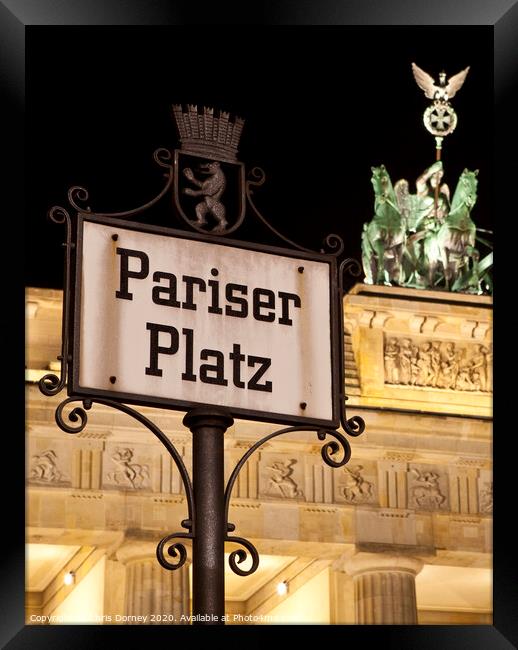 Pariser Platz Street Sign and the Brandenburg Gate Framed Print by Chris Dorney