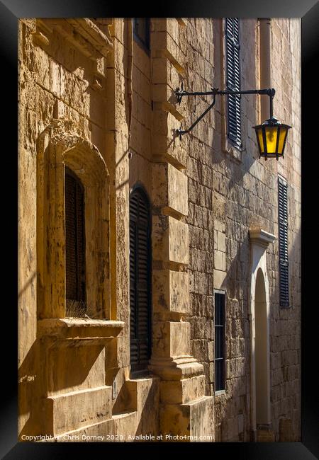 Old Street in Mdina Framed Print by Chris Dorney