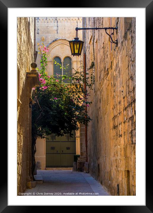 Pretty Street in Mdina  Framed Mounted Print by Chris Dorney