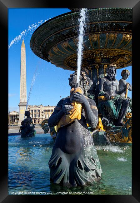 Fountain at Place de la Concorde in Paris Framed Print by Chris Dorney