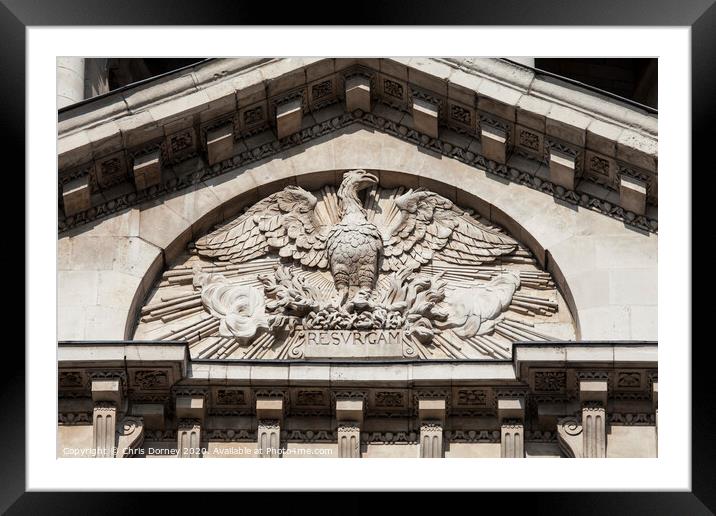 Phoenix Sculpture on the facade of St. Pauls Cathedral Framed Mounted Print by Chris Dorney