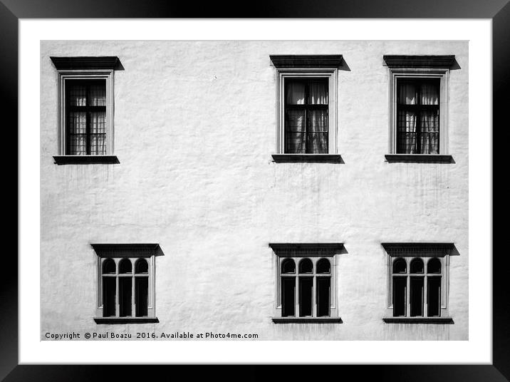 Windows in uneven rows Framed Mounted Print by Paul Boazu