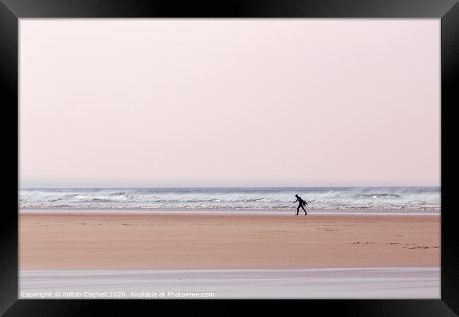 Lone surfer on Polzeath beach, Cornwall, UK Framed Print by Milton Cogheil