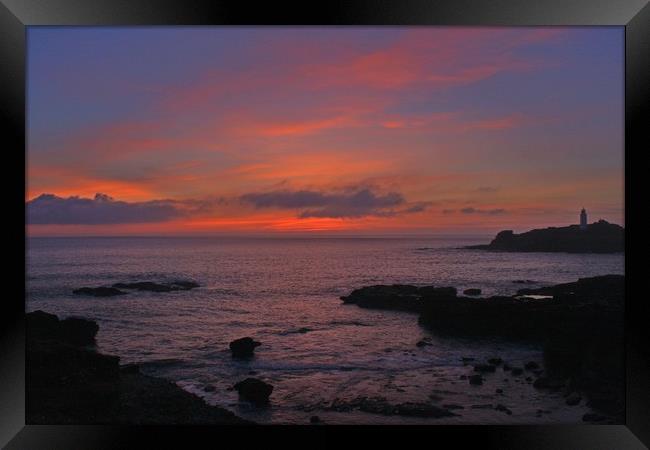 Sunset over Godrevy Framed Print by Paul Smith