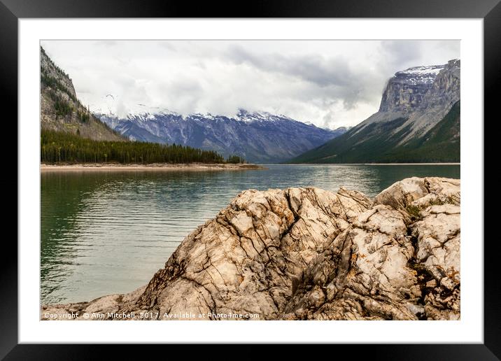 Weathered Rock on the Shore of Lake Minnewanka  Framed Mounted Print by Ann Mitchell