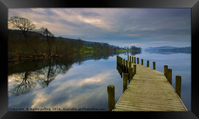 Calm before the storm on Coniston lake  Framed Print by martin pulling